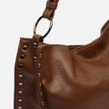 Prido bolso hobo grande con detalles metálicos 