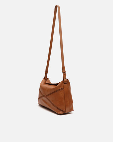 Peliti Tas 