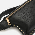 Nairix riñonera con detalles metálicos 