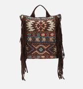 Vana mochila jacquard con flecos y detalles metálicos 