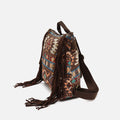 Vana mochila jacquard con flecos y detalles metálicos 