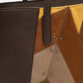 Cachi bolso shopper grande efecto ante y detalles metálicos 