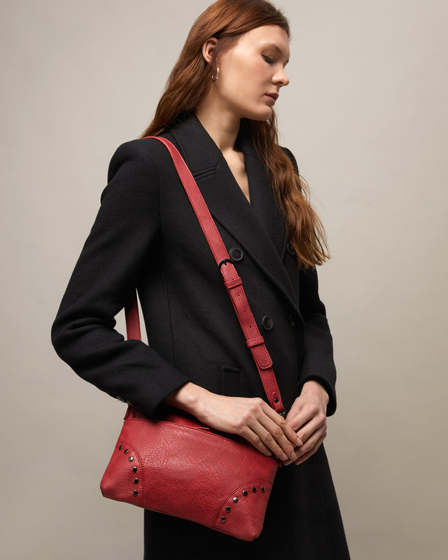 Sereny bolso bandolera pequeño con detalles metálicos